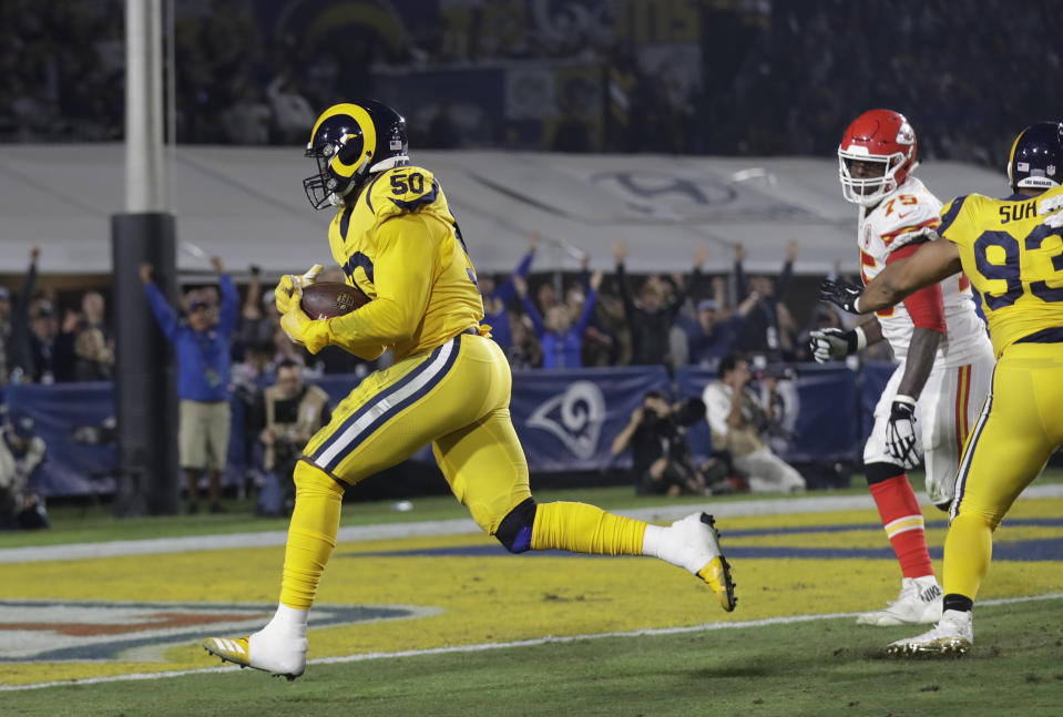 Rams outside linebacker Samson Ebukam (50) scores one of two defensive touchdowns on Monday night against the Chiefs. (AP)
