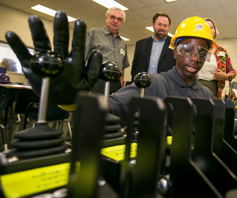 Lake Weir High School student Willie Thomas demonstrates how to run a forklift on the simulator  in 2017.