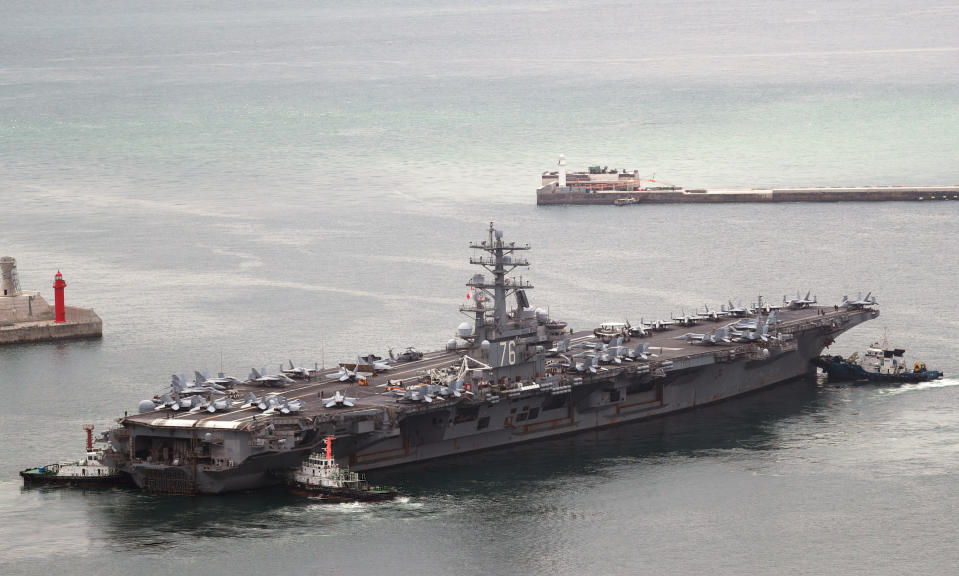 U.S. aircraft carrier USS Ronald Reagan leaves from a port in Busan, South Korea, Monday, Sept. 26, 2022. The U.S. aircraft carrier and its battle group launched drills with South Korean warships off the Korean Peninsula’s east coast on Monday in their first such training in five years, a day after North Korea test-fired a short-range ballistic missile in a possible response to the exercise. (Sohn Hyung-joo/Yonhap via AP)