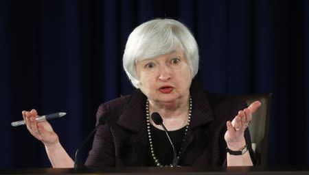 U.S. Federal Reserve Chair Janet Yellen holds a news conference at the Federal Reserve in Washington December 17, 2014. REUTERS/Kevin Lamarque