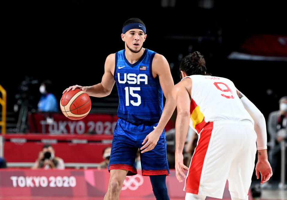 Booker looking to pass during the quarter final Basketball match between the USA and Spain