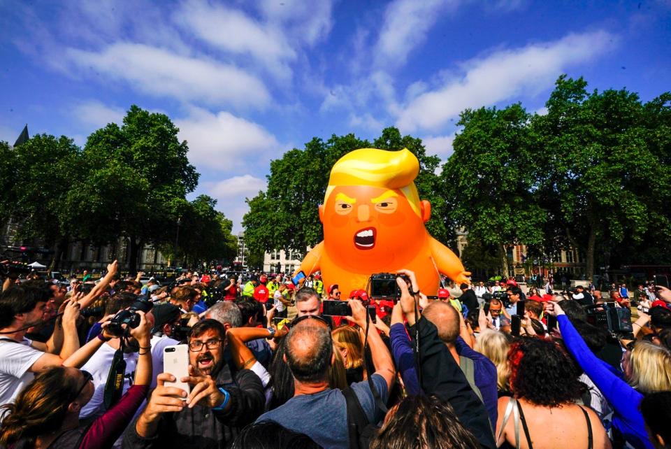 AntiTrump protesters inflate a giant ‘Trump Baby’ over Parliament Square