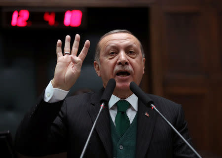 FILE PHOTO: Turkish President Tayyip Erdogan addresses members of parliament from his ruling AK Party (AKP) during a meeting at the Parliament in Ankara, Turkey, November 7, 2017. REUTERS/Umit Bektas/File Photo