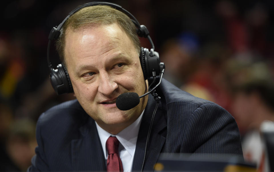 ESPN analysts Dan Dakich awaits the start of the Maryland and Indiana NCAA college basketball game, Tuesday, Jan. 10, 2017 in College Park, Md. (AP Photo/Gail Burton)