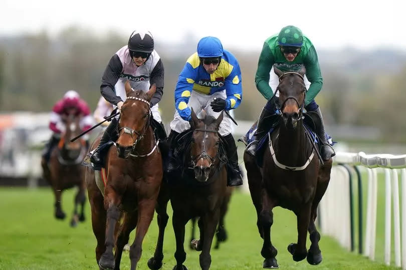 Bob Olinger (left), ridden by Rachael Blackmore; Langer Dan, ridden by Harry Skelton (centre); and Impaire Et Passe, ridden by Paul Townend (right), cross the line almost as one but after a stewards enquiry Impaire Et Passe, who was a nose ahead, won the William Hill Aintree Hurdle on day one of the 2024 Randox Grand National Festival at Aintree Racecourse on Thursday, April 11 2024