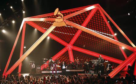 Robin Thicke (R) performs "Blurred Lines" with Verdine White of Earth, Wind & Fire at The Grammy Nominations Concert Live - Countdown to Music's Biggest Night event at Nokia theatre in Los Angeles December 6, 2013. REUTERS/Mario Anzuoni