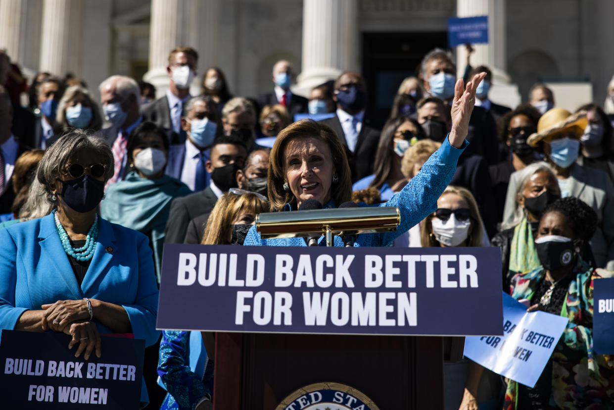 U.S. House Speaker Nancy Pelosi, a Democrat from California, center, speaks during a 