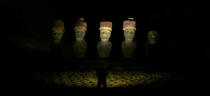 FILE PHOTO: A night view of "Moai" statues at Anakena beach on Easter Island, 4,000 km (2,486 miles) west of Santiago, Oct. 30, 2003. Easter Island's mysterious "Moai," giant head statues carved out of volcanic rock, are in danger of being destroyed by years of tropical rains and wind as well as careless humans and farms animals. Experts have called on the international community to commit funds to preserve the monoliths, whose mystery draws tourists to the world's most remote inhabited island. REUTERS/Carlos Barria