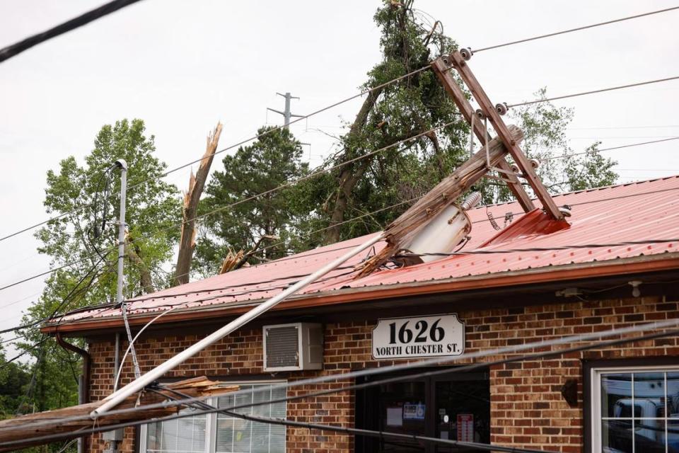 Severe storms caused a utility pole to fall on the roof of Allen’s Mobile Home and RV Superstore on North Chester Street in Gastonia, N.C., on Thursday, May 9, 2024. Storms tore through Gastonia yesterday causing property damage and causing power outages. Melissa Melvin-Rodriguez/mrodriguez@charlotteobserver.com