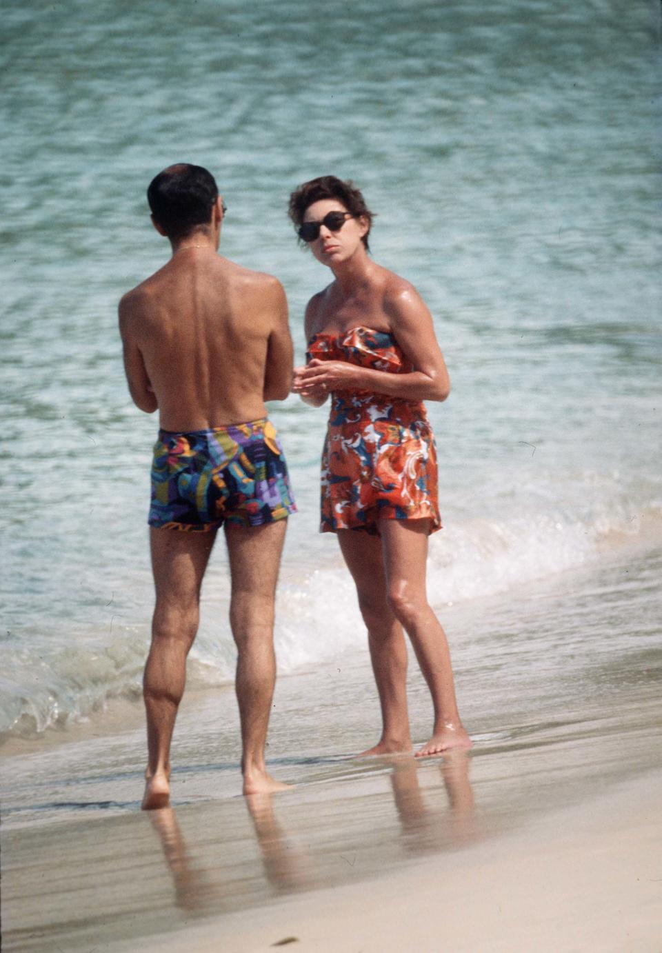 Princess Margaret in swimming costume chats to a friend on the beach whilst on holiday in Mustique in 1976.Photo: Anwar Hussein