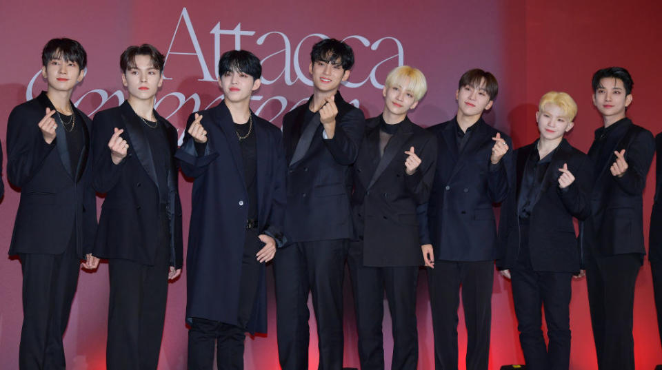 members of Seventeen posing during an event