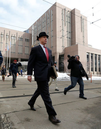 Defense attorney Tom Plunkett leaves the Hennepin County Public Safety Facility after his client, former Minneapolis police officer Mohamed Noor, made his first court appearance after being charged in the fatal shooting of Justine Ruszczyk Damond in Minneapolis, Minnesota, U.S. March 21, 2018. REUTERS/Eric Miller