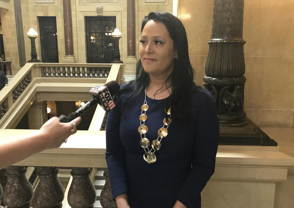 FILE - Shannon Holsey, president of the Stockbridge-Munsee tribe, speaks to reporters after giving the annual State of the Tribes address in the Wisconsin state Capitol Tuesday, April 4, 2017, in Madison, Wisc. Indigenous students from any of Wisconsin's 11 tribes will be able to attend the University of Wisconsin-Madison for free beginning next fall, Chancellor Jennifer Mnookin announced Monday, Dec. 18, 2023. Holsey called the aid program “cycle-breaking” for Indigenous youth. (AP Photo/Cara Lombardo, File)