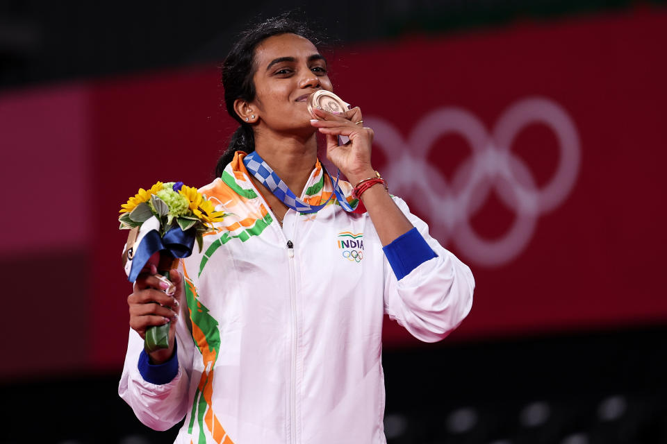 CHOFU, JAPAN - AUGUST 01: Bronze medalist Pusarla V. Sindhu of Team India poses on the podium during the medal ceremony for the Women’s Singles badminton event on day nine of the Tokyo 2020 Olympic Games at Musashino Forest Sport Plaza on August 01, 2021 in Chofu, Tokyo, Japan. (Photo by Lintao Zhang/Getty Images)