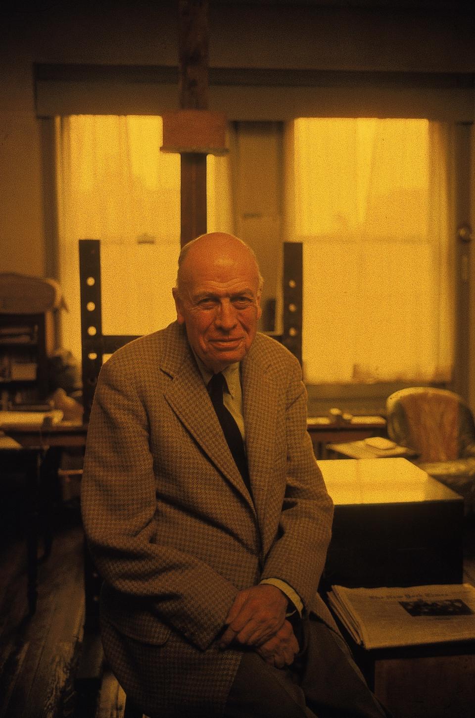 Portrait of painter Edward Hopper sitting in his studio.