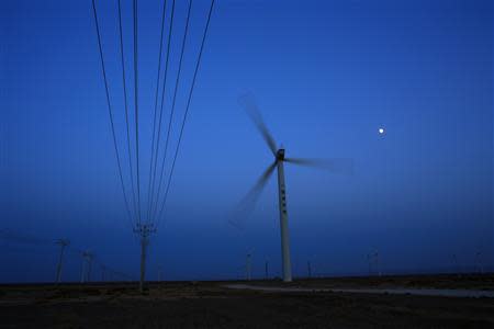 A wind turbine for generating electricity is seen at a wind farm in Guazhou, 950km (590 miles) northwest of Lanzhou, Gansu Province September 15, 2013. REUTERS/Carlos Barria