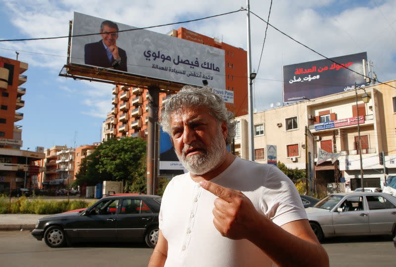 Abdallah al-Rahman speaks during an interview with Reuters in Tripoli