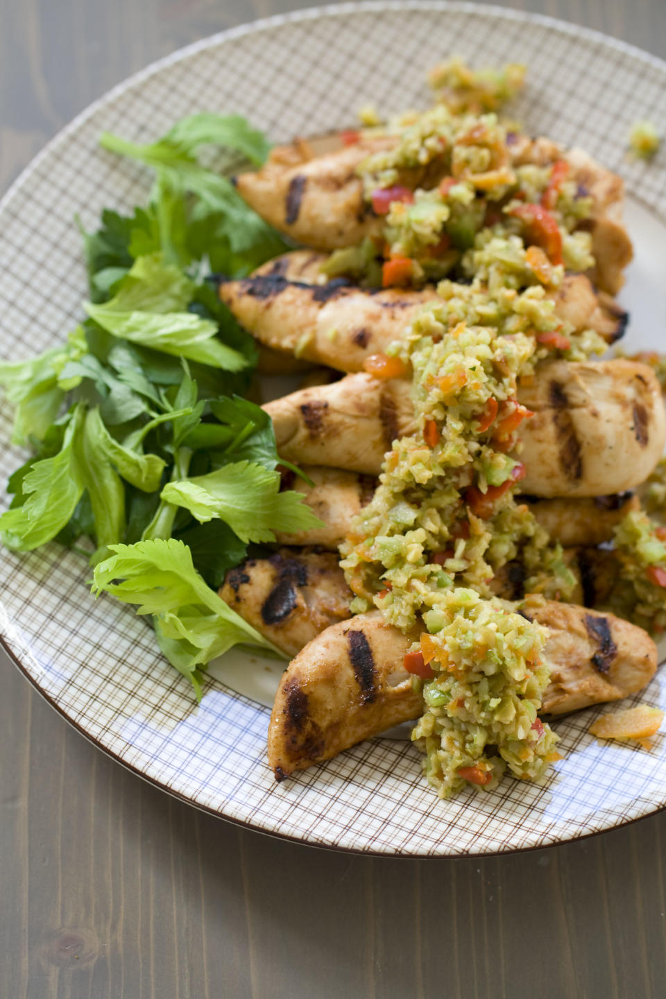 This Sept. 23, 2013 photo shows bloody mary chicken With olive-celery tapenade in Concord, N.H. (AP Photo/Matthew Mead)