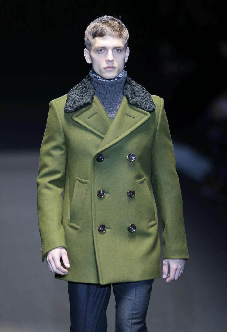 A model wears a creation for Gucci men's Fall-Winter 2013-14 collection, part of the Milan Fashion Week, unveiled in Milan, Italy, Monday, Jan. 14, 2013. (AP Photo/Antonio Calanni)