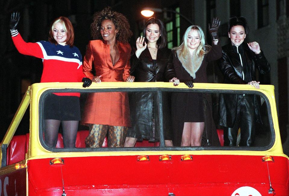 Ginger Spice (Geri Halliwell), Scary Spice (Melanie Brown), Posh Spice (Victoria Adams), Baby Spice (Emma Bunton) and Sporty Spice (Melanie Chisholm) arrive for a screening of "Spice World" at Planet Hollywood on Jan. 14, 1998.