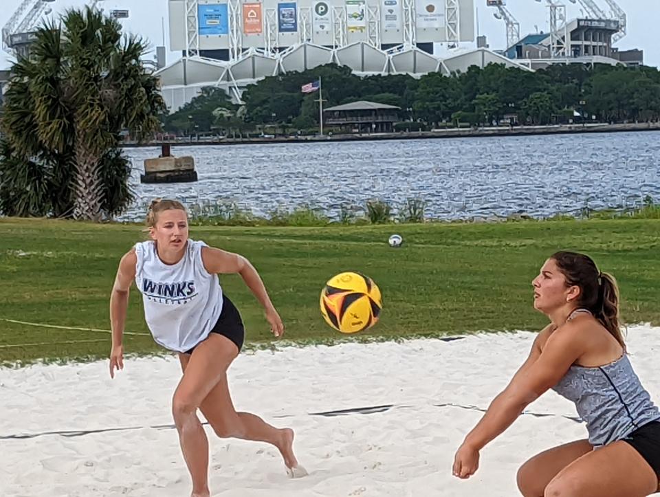 Bishop Kenny players run through high school beach volleyball practice ahead of the FHSAA championships on May 3, 2022. [Clayton Freeman/Florida Times-Union]