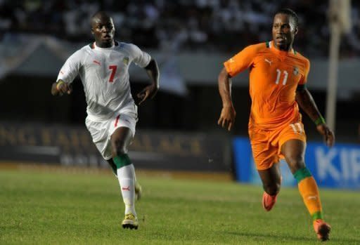 Ivory Coast striker Didier Drogba (right) is tracked by Senegal's Moussa Sow during an Africa Cup of Nations qualifier at Léopold Sédar Senghor stadium in Dakar on October 13. Ivory Coast will once again be the team to beat when South Africa stages the finals of the 2013 Africa Cup of Nations early next year