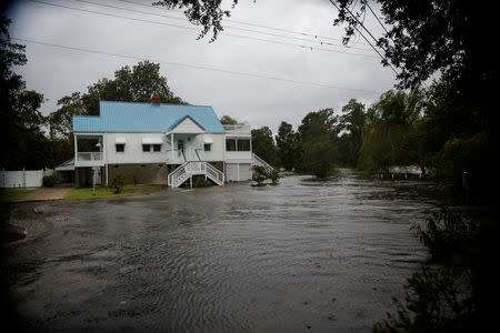 Water from Neuse River floods houses as Hurricane Florence comes ashore in New Bern, North Carolina, U.S., September 13, 2018. REUTERS/Eduardo Munoz