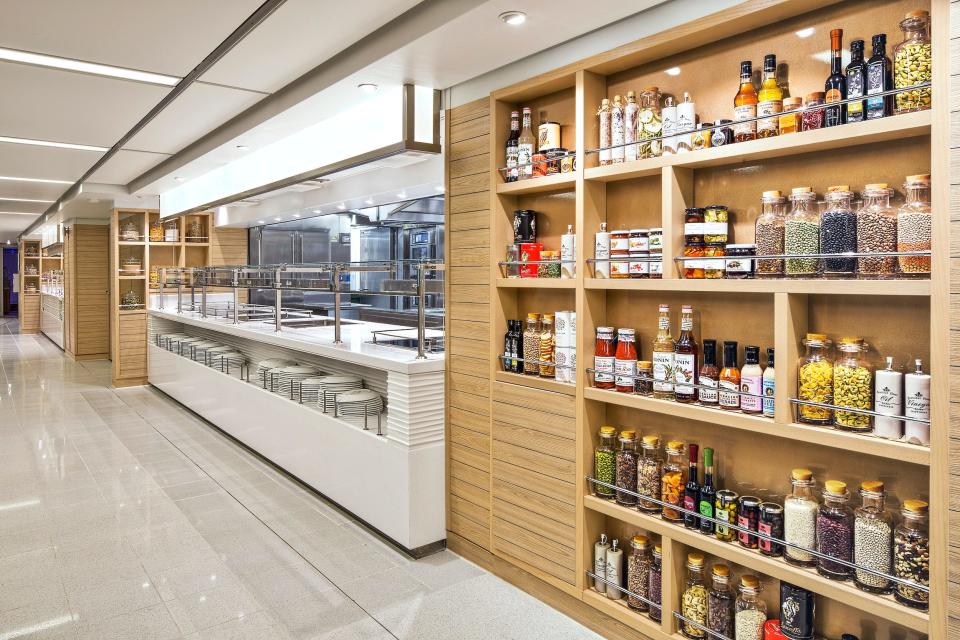 a buffet surrounded by walls of decor with food