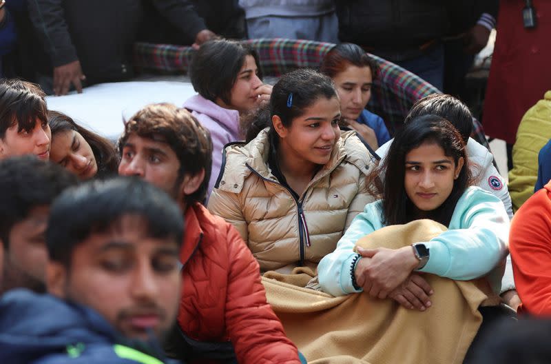 FILE PHOTO: Indian wrestlers take part in a protest demanding the disbandment of the WFI and the investigation of its head by the police, who they accuse of sexually harassing female players, at Jantar Mantar in New Delhi