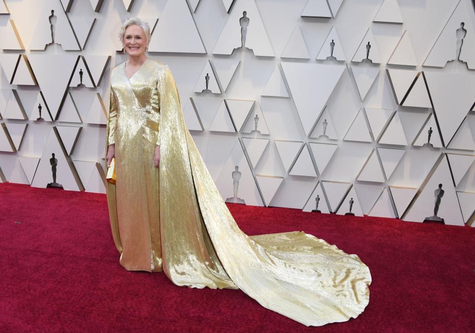 <p>The Best Actress nominee and star of “The Wife” looked regal in gold as she arrived at the Oscars.<em>[Photo: Getty]</em> </p>