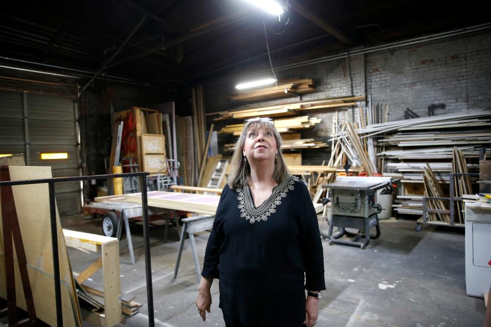 Rhonda Clark looks at set shop before rehearsal for "Picasso at the Lapin Agile" at the new Carpenter Square Theatre in Oklahoma City, Thursday, June, 29, 2023. 