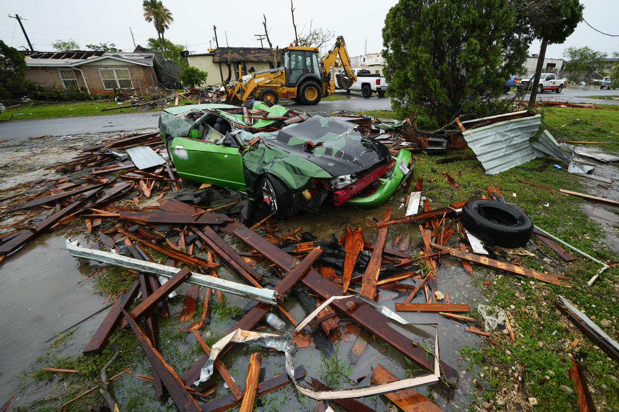 Damage is seen after a tornado hit Saturday, May 13, 2023, in the unincorporated community of Laguna Heights, Texas near South Padre Island. Authorities say one person was killed when a tornado struck the southernmost tip of Texas on the Gulf coast. (AP Photo/Julio Cortez)