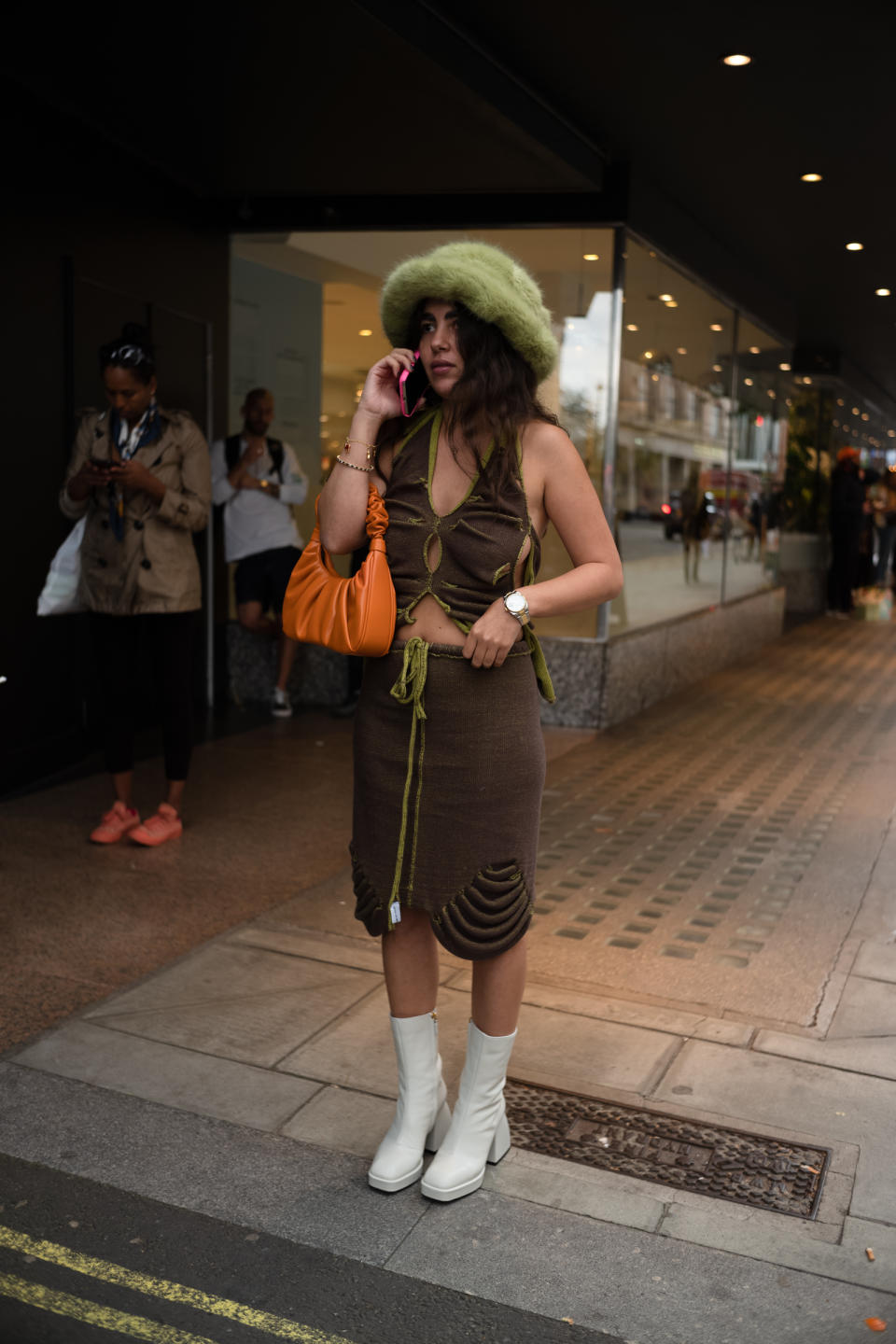 Street Style at London Fashion Week Spring 2022. - Credit: Yu Fujiwara for WWD