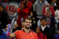 Tennis - China Open Men's Singles quarterfinal - Beijing, China - 07/10/16. Grigor Dimitrov of Bulgaria celebrates after he defeated Rafael Nadal of Spain. REUTERS/Thomas Peter