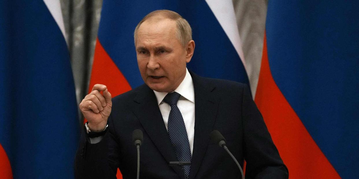 Russian President Vladimir Putin gestures during a joint press conference with French President after their meeting in Moscow, on February 7, 2022. - International efforts to defuse the standoff over Ukraine intensified with French President holding talks in Moscow and German Chancellor in Washington to coordinate policies as fears of a Russian invasion mount. (Photo by Thibault Camus / POOL / AFP) (Photo by THIBAULT CAMUS/POOL/AFP via Getty Images)