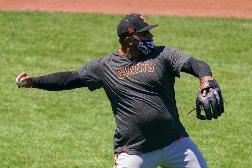 The San Francisco Giants' Pablo Sandoval throws the baseball during a workout at Oracle Park.
