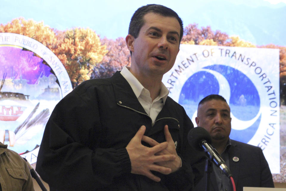 U.S. Transportation Secretary Pete Buttigieg speaks about a federal pilot project to fund wildlife crossing corridors along busy roads during an announcement in Santa Ana Pueblo, N.M., on Tuesday, April 4, 2023. The $350 million effort will be financed with federal infrastructure dollars. Buttigieg announced the opening of the first round of grants during his visit to New Mexico. (AP Photo/Susan Montoya Bryan)