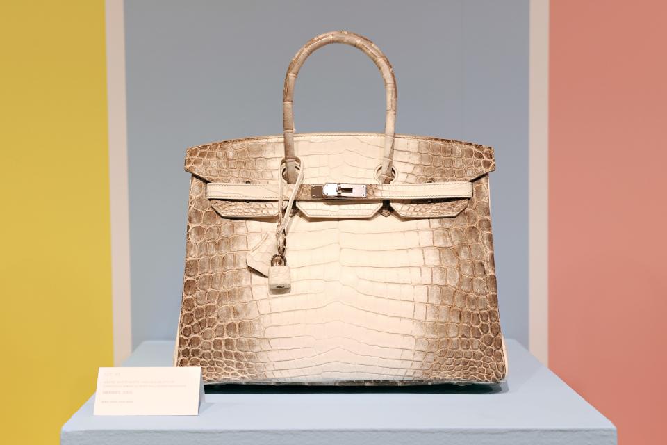 A Hermès matte white Himalayan Niloticus crocodile Birkin 35 with palladium hardware is on display during a press preview of the upcoming Luxury Week at Christie's on June 04, 2021 in New York City.