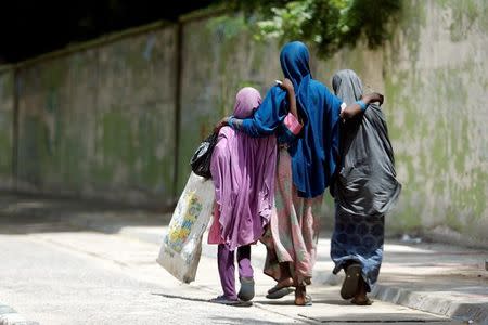 Girls walk on a street in Maiduguri, Borno, Nigeria August 30, 2016. REUTERS/Afolabi Sotunde