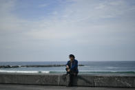 US actor Johny Deep poses on a wall during a photocall during the 69th San Sebastian Film Festival, in San Sebastian, northern Spain, Wednesday, Sept. 22, 2021. Johny Depp will be receiving on the night Donostia Award for his contribution to the cinema. (AP Photo/Alvaro Barrientos)