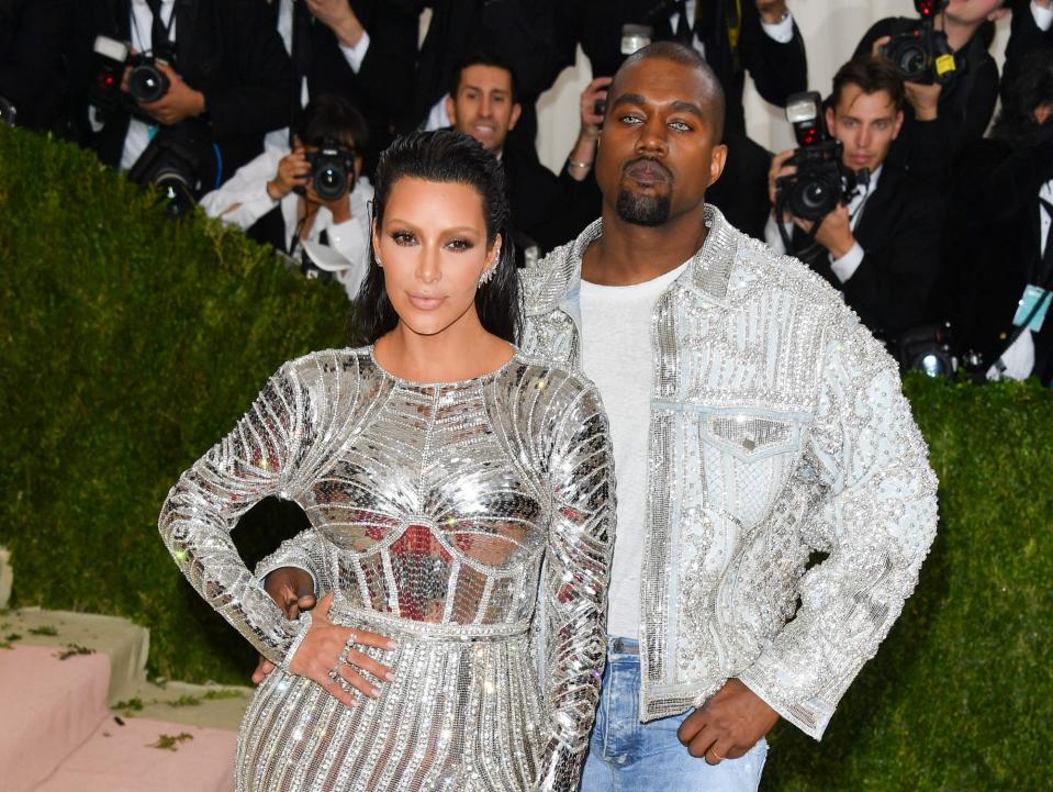 Kim Kardashian and Kanye West attend the 2016 Met Gala.