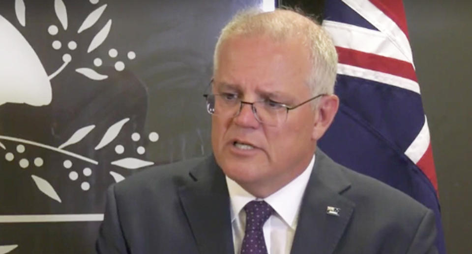 Scott Morrison shown speaking at a press conference.