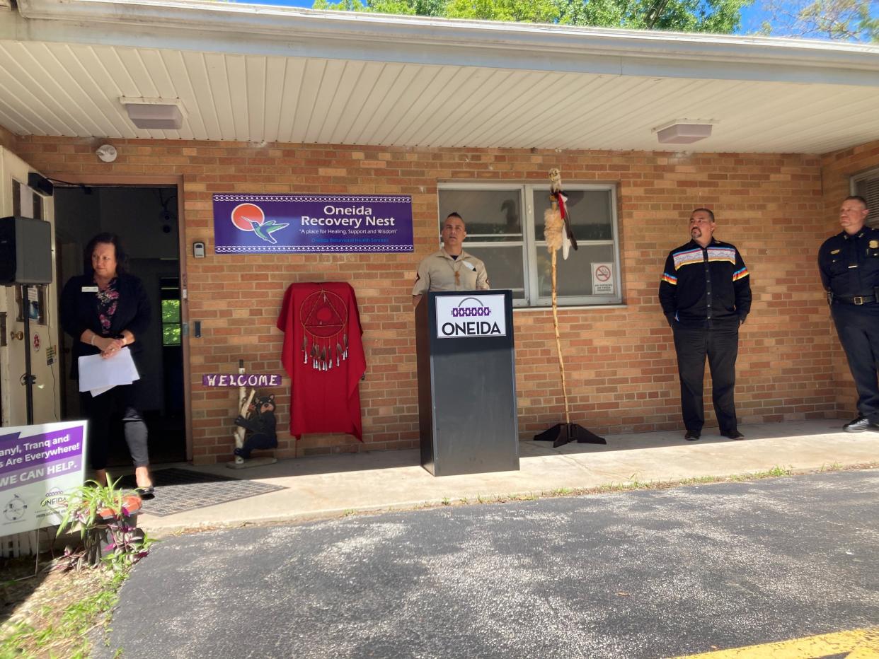 Patrick Danforth, center, talks about his lived experiences with drugs and alcohol. Rehab, he said, comes in many forms, but taking the first step to recovery is crucial. Mari Kriescher, director of Oneida Behavioral Health, stands left of Danforth, and Tehassi Hill, chairperson of Oneida Nation, and Joel Maxam, assistant chief of Oneida Police, stand at Danforth's right.