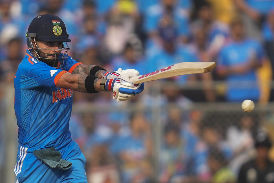 India's Virat Kohli plays a shot during the ICC Men's Cricket World Cup first semi final match between India and New Zealand in Mumbai, India, Wednesday, Nov. 15, 2023. (AP Photo/Rafiq Maqbool)