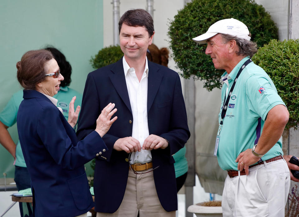 STROUD, UNITED KINGDOM - AUGUST 04: (EMBARGOED FOR PUBLICATION IN UK NEWSPAPERS UNTIL 24 HOURS AFTER CREATE DATE AND TIME) Princess Anne, Princess Royal talks with husband Vice Admiral Timothy Laurence and ex-husband Mark Phillips as they attend the Festival of British Eventing at Gatcombe Park on August 4, 2007 in Stroud, England. (Photo by Max Mumby/Indigo/Getty Images)