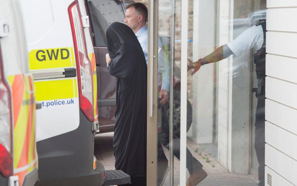 Police raid and make arrests at an East London address - Credit:  David Rose