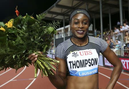 Athletics - IAAF Athletics Diamond League meeting Lausanne - Stade Olympique de la Pontaise, Lausanne, Switzerland - 25/8/2016 - Elaine Thompson of Jamaica reacts following the women's 100m competition. REUTERS/Denis Balibouse