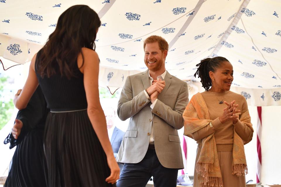 Meghan had her two biggest supporters by her side when she hosted an event celebrating the special cookbook <a rel="nofollow noopener" href="https://people.com/royals/meghan-markle-together-our-community-cookbook-film/" target="_blank" data-ylk="slk:she helped create;elm:context_link;itc:0;sec:content-canvas" class="link ">she helped create</a> in September. Harry and her mom, Doria Ragland, smiled as <a rel="nofollow noopener" href="https://people.com/royals/meghan-markle-first-royal-speech-cookbook-prince-harry-mom-doria-proudly-watch/" target="_blank" data-ylk="slk:Meghan confidently delivered her first speech as a royal;elm:context_link;itc:0;sec:content-canvas" class="link ">Meghan confidently delivered her first speech as a royal</a> – without notes!