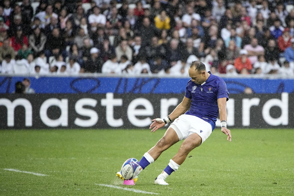 Samoa's Christian Leali'ifano kicks a conversion during the Rugby World Cup Pool D match between Argentina and Samoa at the Stade Geoffroy Guichard in Saint-Etienne, France, Friday, Sept. 22, 2023. (AP Photo/Laurent Cipriani)