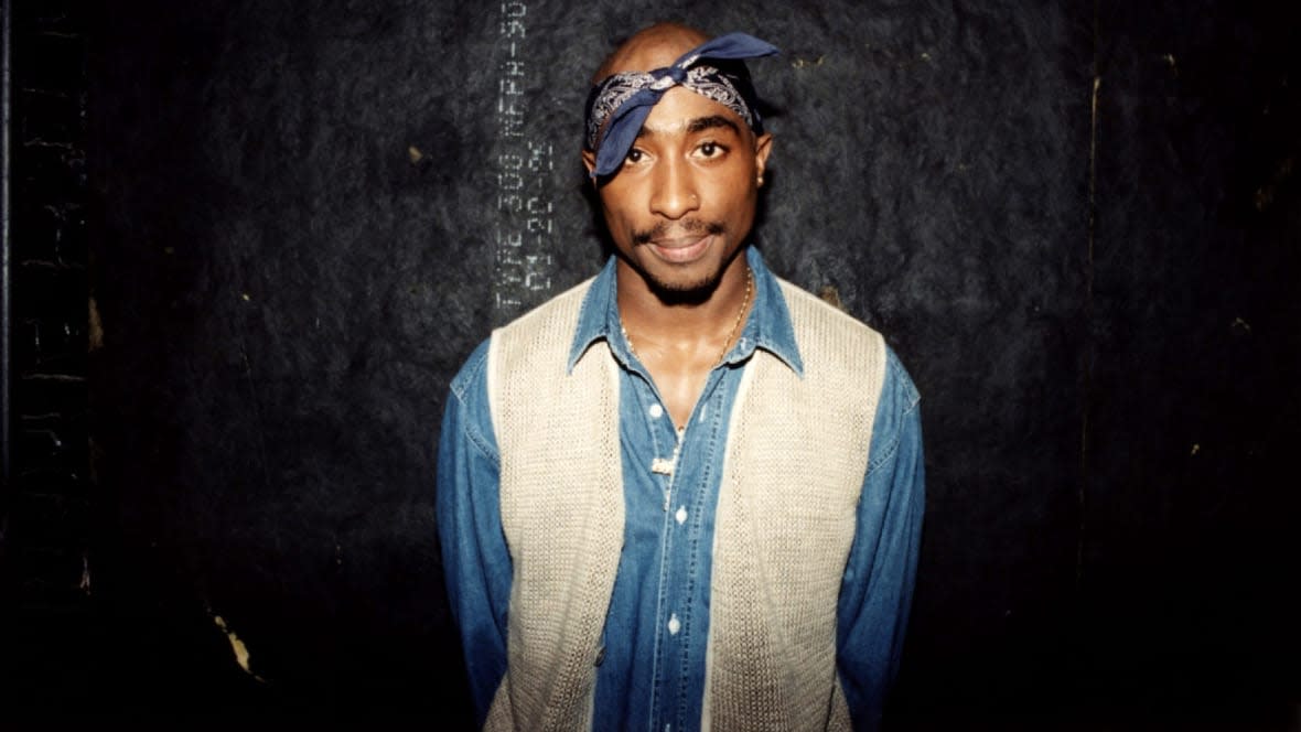 Rapper Tupac Shakur poses for photos backstage after his performance at the Regal Theater in Chicago, Illinois in March 1994. (Photo By Raymond Boyd/Getty Images)